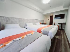Postel nebo postele na pokoji v ubytování 嵐 Hotel Arashi Tengachaya No005