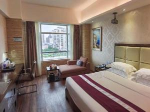 Ένα ή περισσότερα κρεβάτια σε δωμάτιο στο Fuzhou Xin Zi Yang Hotel +256 φωτογραφίες