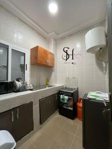 Køkken eller tekøkken på Sweet home appart & extase room