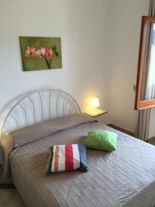 Un pat sau paturi într-o cameră la Fonteluna Residence