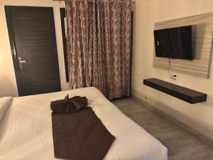 TV a/nebo společenská místnost v ubytování Ritz The Boutique Hotel + 9 fotografií