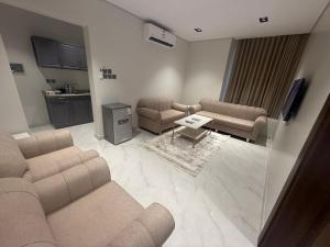 Gallery image of جوهرة الكروان للشقق المخدومة in Al Madinah +18 photos