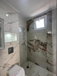 A bathroom at Dracena Guesthouse