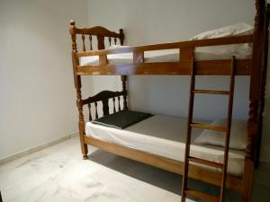 a couple of bunk beds in a room at Homestay Cozy PD Villa, Port Dickson in Port Dickson +25 photos