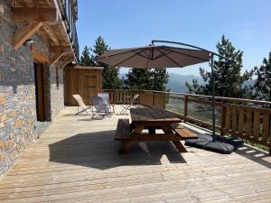 Balkón nebo terasa v ubytování L'Esquirol Appart - Location T3 avec vue imprenable - Les Angles