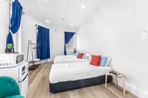 Letto o letti in una camera di Stay Today Hostel