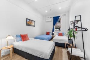 Letto o letti in una camera di Stay Today Hostel