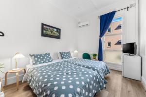 Letto o letti in una camera di Stay Today Hostel
