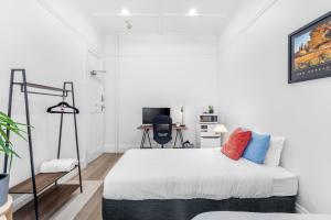 Letto o letti in una camera di Stay Today Hostel
