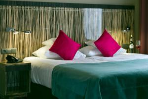 Posteľ alebo postele v izbe v ubytovaní Hotel Fado Spa & Restaurant