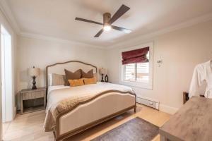 a bedroom with a bed and a ceiling fan at New Listing 3 BR 3 BA Aspen Condo near Gondola in Aspen