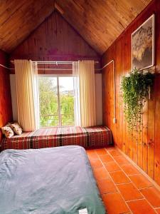 Postel nebo postele na pokoji v ubytování Zen Homestay Đà Lạt