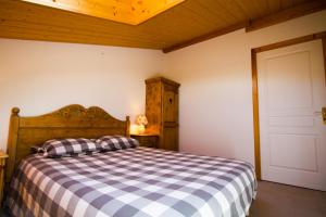 Ein Bett oder Betten in einem Zimmer der Unterkunft Appt Meije - Centre village, au calme - AravisTour