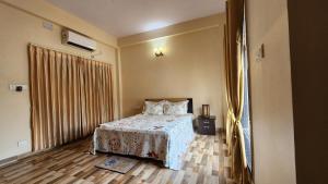 En eller flere senge i et værelse på Green County Wellness Retreat + 68 billeder