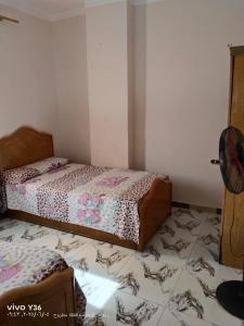 Postel nebo postele na pokoji v ubytování Marsa Matrouh Chalet