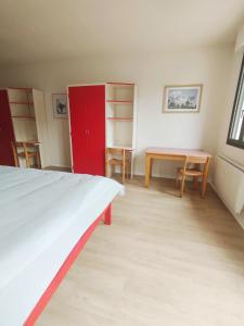 Postel nebo postele na pokoji v ubytování Gite du Domaine Laffraut