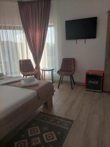 Μια τηλεόραση ή/και κέντρο ψυχαγωγίας στο Casa FAVORIT +10 φωτογραφίες