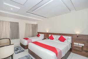 Postel nebo postele na pokoji v ubytování Super Hotel O Ivy Dew Drops