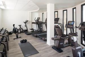 a gym with treadmills and elliptical machines at Thalazur Arcachon in Arcachon