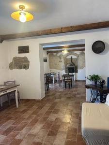 a living room with a couch and a table at Castrum Gallani in Barberino di Mugello