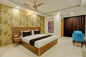 Postel nebo postele na pokoji v ubytování Hotel Cozy Cave Delhi