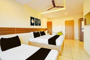Postel nebo postele na pokoji v ubytování Hotel Cozy Cave Delhi