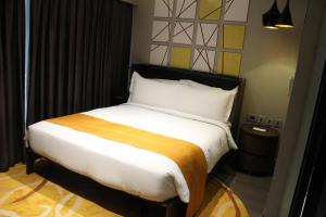 Postel nebo postele na pokoji v ubytování Hotel Cozy Cave Delhi