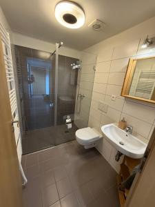 Vannituba majutusasutuses Apartmán U Venuše