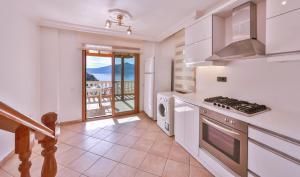 Kuchyň nebo kuchyňský kout v ubytování Kuluhana Hotel & Villas Kalkan