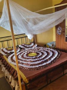 Katil atau katil-katil dalam bilik di Villa emirobs