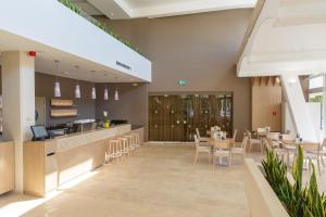 Ein Restaurant oder anderes Speiselokal in der Unterkunft Hotel Plavi Plava Laguna 