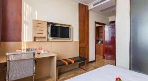 TV a/nebo společenská místnost v ubytování 7 Days Premium·Hotel Pei County Longcheng International