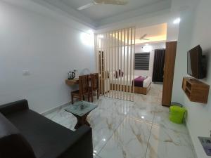 Hotel The Mountmist的电视和/或娱乐中心