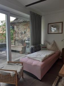 Postel nebo postele na pokoji v ubytování Apartment am Vierkanthof im Thermenland