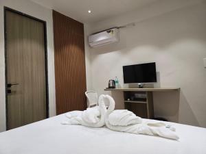 Postel nebo postele na pokoji v ubytování Hotel priyansh