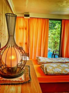 a large vase sitting on a table in a room at Pyramid in Visoko +49 photos