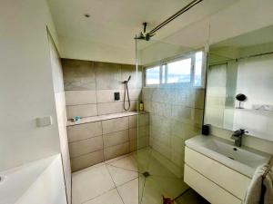 Ein Badezimmer in der Unterkunft Suite by Chalet de Tahiti