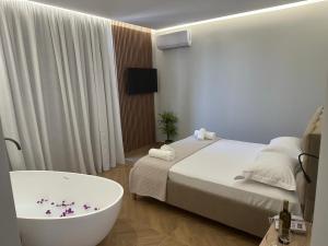 Postel nebo postele na pokoji v ubytování Hotel Parid