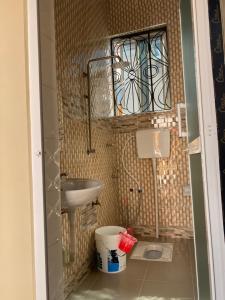 Koupelna v ubytování Kilimanjaro lodge