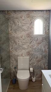 Koupelna v ubytování Punto Mágico, apartamento junto al mar