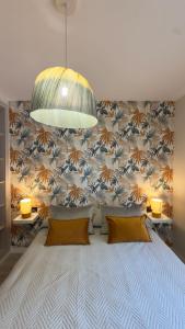 Postel nebo postele na pokoji v ubytování Punto Mágico, apartamento junto al mar