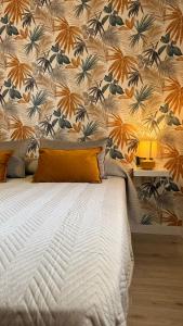 Postel nebo postele na pokoji v ubytování Punto Mágico, apartamento junto al mar