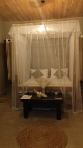 Letto o letti in una camera di Ginger Harmony Guesthouse and Cafe