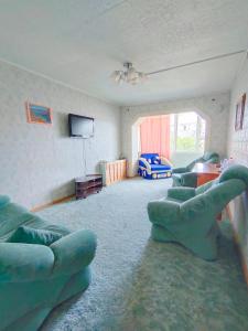 Et tv og/eller underholdning på Гостиница Зеленая