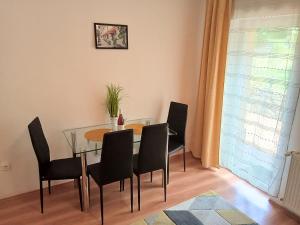 Posezení v ubytování Orient Apartmanház