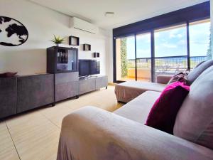 TV a/nebo společenská místnost v ubytování Duplex con piscina en Rubí
