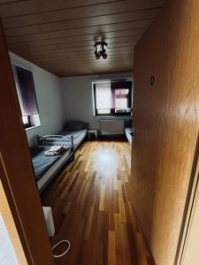 Postel nebo postele na pokoji v ubytování Pension mitten im Pfälzerwald