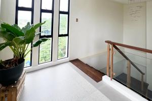 Postel nebo postele na pokoji v ubytování 717 Residences Iloilo