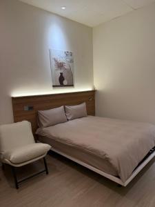 Postel nebo postele na pokoji v ubytování 躺平青旅-住宿推薦