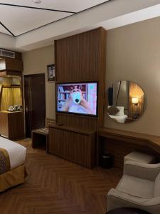 TV a/nebo společenská místnost v ubytování Golden Tower Hotel Al Khobar Corniche